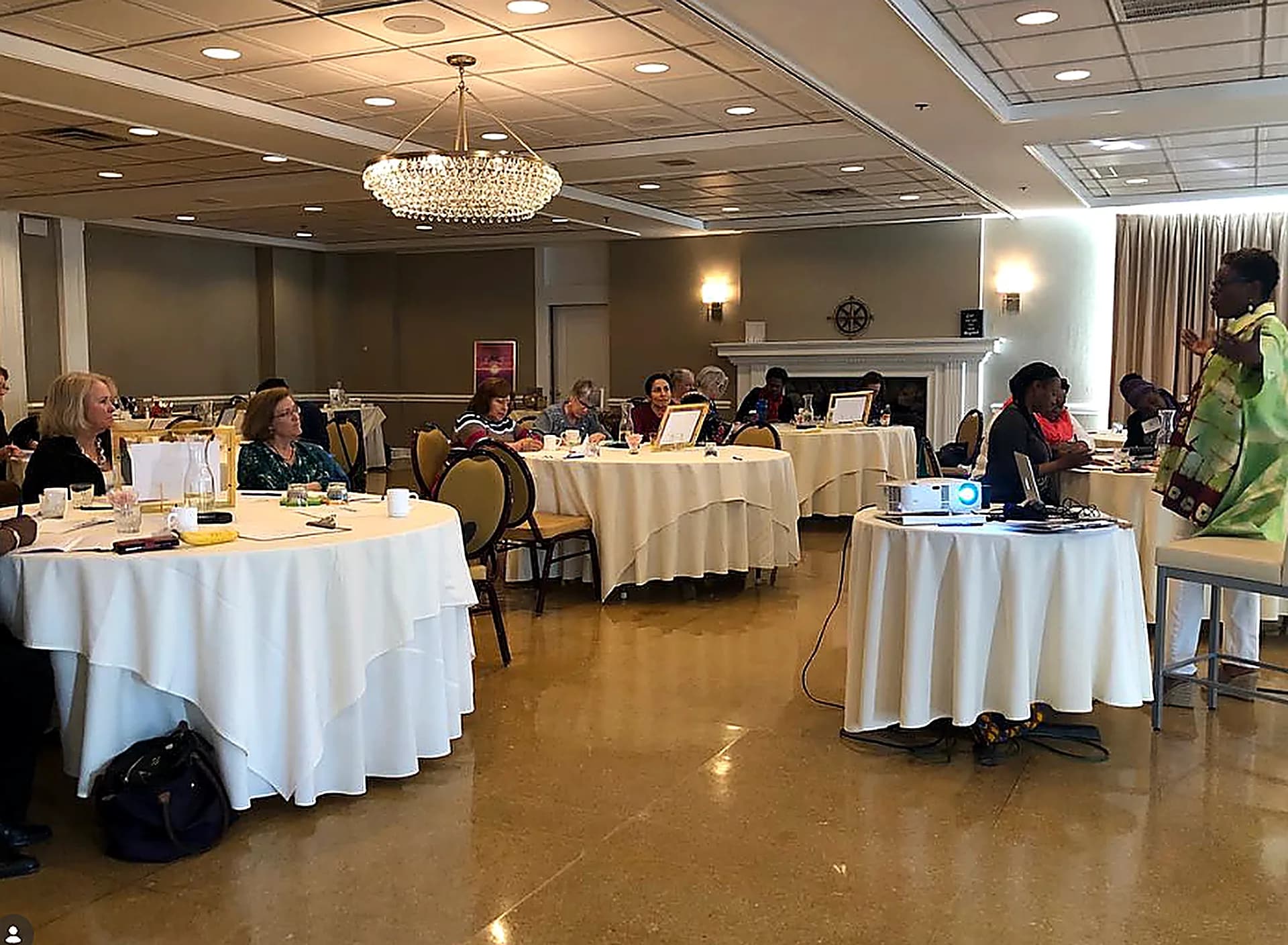 Dr. TLC leading a workshop and training session